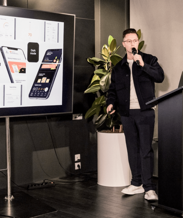 The meeting leader presents a new marketing strategy.